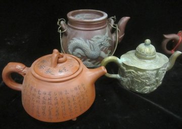 3 of 5 tourist junk teapots.jpg