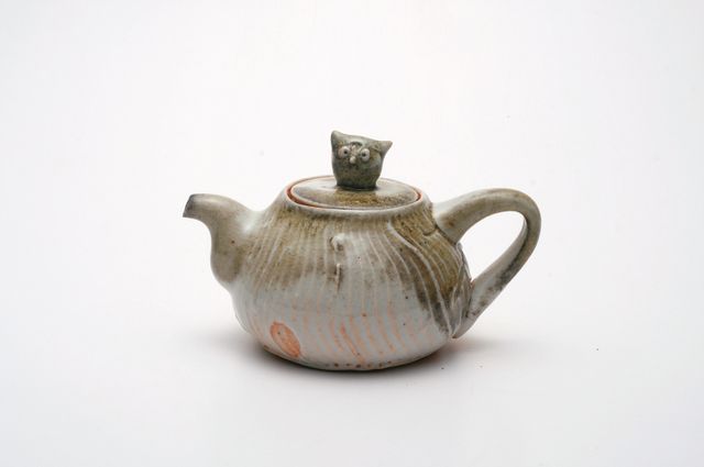 133. $120. 150ml pure porcelain-20%stoneware-shino-soda.jpg