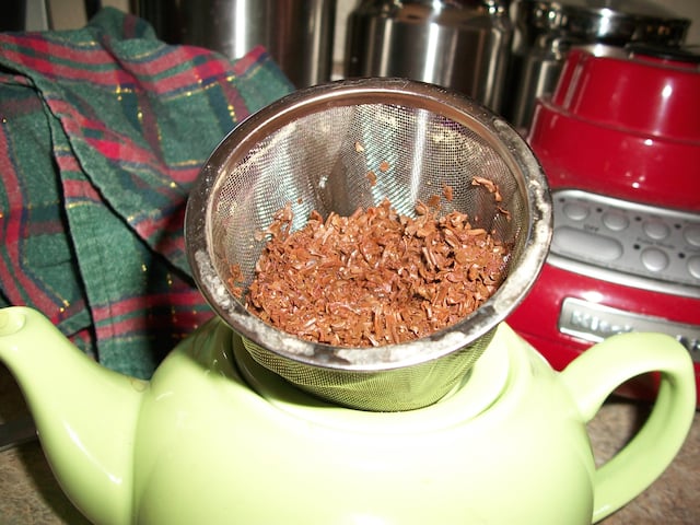 tea pot with strainer on top showing leaves2.jpg